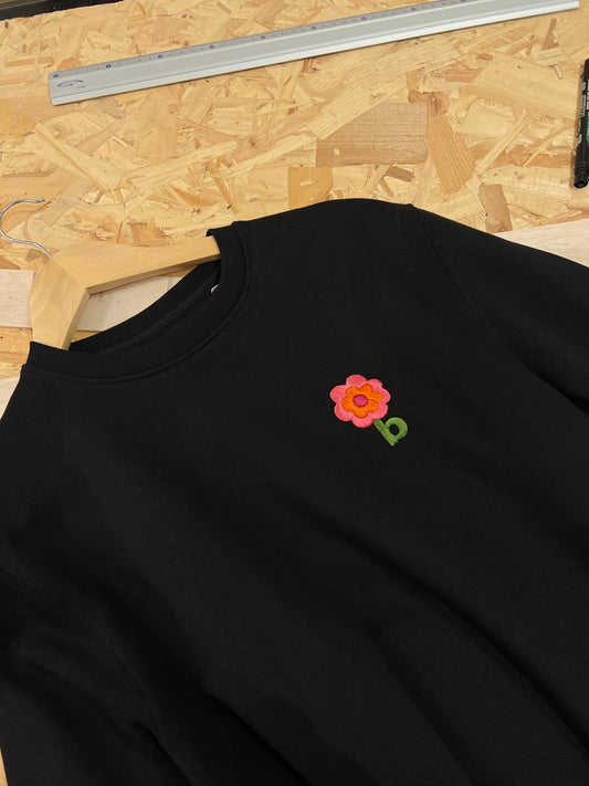 Le sweat-shirt fleur de b